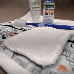 Travel toothbrush and face washing bag