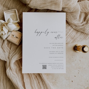 May include: A white save the date card with the text "happily ever after" in black cursive script. The card announces the wedding of Ava and Benjamin on Saturday, May 24, 202X in Kansas City, Missouri. A QR code is included for additional details.