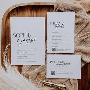 May include: Wedding invitation suite with white cardstock and black text. The invitation features the couple's names, "Sophie + Jackson", the date "06.07.2X", and the time and location of the ceremony. The details card includes information about the reception, accommodations, and a QR code for more information. The RSVP card includes a QR code and the RSVP deadline, "Kindly RSVP by April Twelfth".