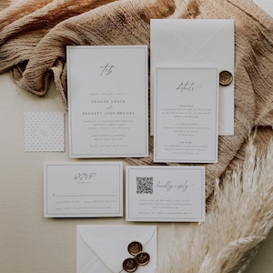 May include: A set of wedding invitations with a minimalist design. The invitations are white with black text and a simple calligraphy font. The invitations include the couple's names, the date and time of the wedding, the location, and RSVP information. The invitations are decorated with a wax seal and a QR code.