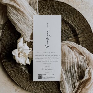 May include: A white thank you card with black text. The card says "Thank you to our family and friends. From the bottom of our hearts, thank you for being here to celebrate with us on our wedding day. Your company, love, and well wishes have made our day truly unforgettable. Please eat, drink, and enjoy yourselves tonight. We can't wait to make memories with you on our first night as husband and wife. All our love, Alicia + Kmett June 7, 2023 | Kansas City"