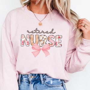Retired Nurse Christmas shirt, Coquette style Xmas sweatshirt for Retired Nurse, Pink Christmas Party Shirt, Nurse Retirement gift
