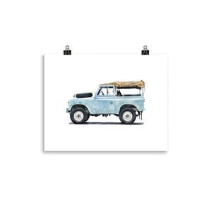 May include: A light blue vintage SUV illustration with a tan canvas top and black spare tyre. The vehicle has large off-road tyres and is set against a white background. The artwork is mounted on white paper.