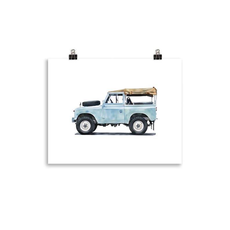 May include: A light blue vintage SUV illustration with a tan canvas top and black spare tyre. The vehicle has large off-road tyres and is set against a white background. The artwork is mounted on white paper.