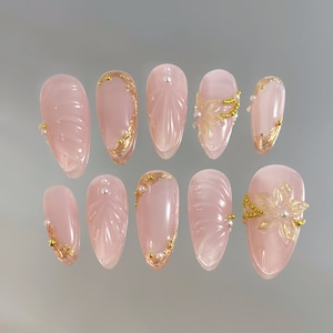 pink and gold summer nails/flower nails/gold accent nails/custom press on nails/3D gel nails/coquette nails/long nails/almond nails