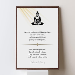 May include: A framed print featuring a seated Buddha silhouette in black. The print includes text in English and another language, along with decorative elements. The frame is a dark brown color.