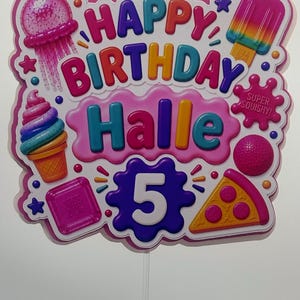 May include: A colourful birthday cake topper featuring the text "HAPPY BIRTHDAY Halle 5" in multi-coloured bubble letters. The design includes illustrations of a pink jellyfish, a rainbow popsicle, an ice cream cone, a pizza slice, and a squishy toy.