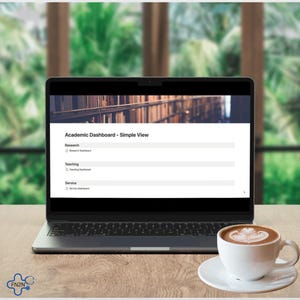 Może przedstawiać: Ekran laptopa wyświetlający pulpit nawigacyjny akademicki z tytułem "Academic Dashboard - Simple View". Pulpit nawigacyjny składa się z trzech sekcji: Badania, Nauczanie i Usługi. Każda sekcja zawiera pole wyboru i pole tekstowe. Laptop znajduje się na drewnianym stole z filiżanką kawy przed nim.