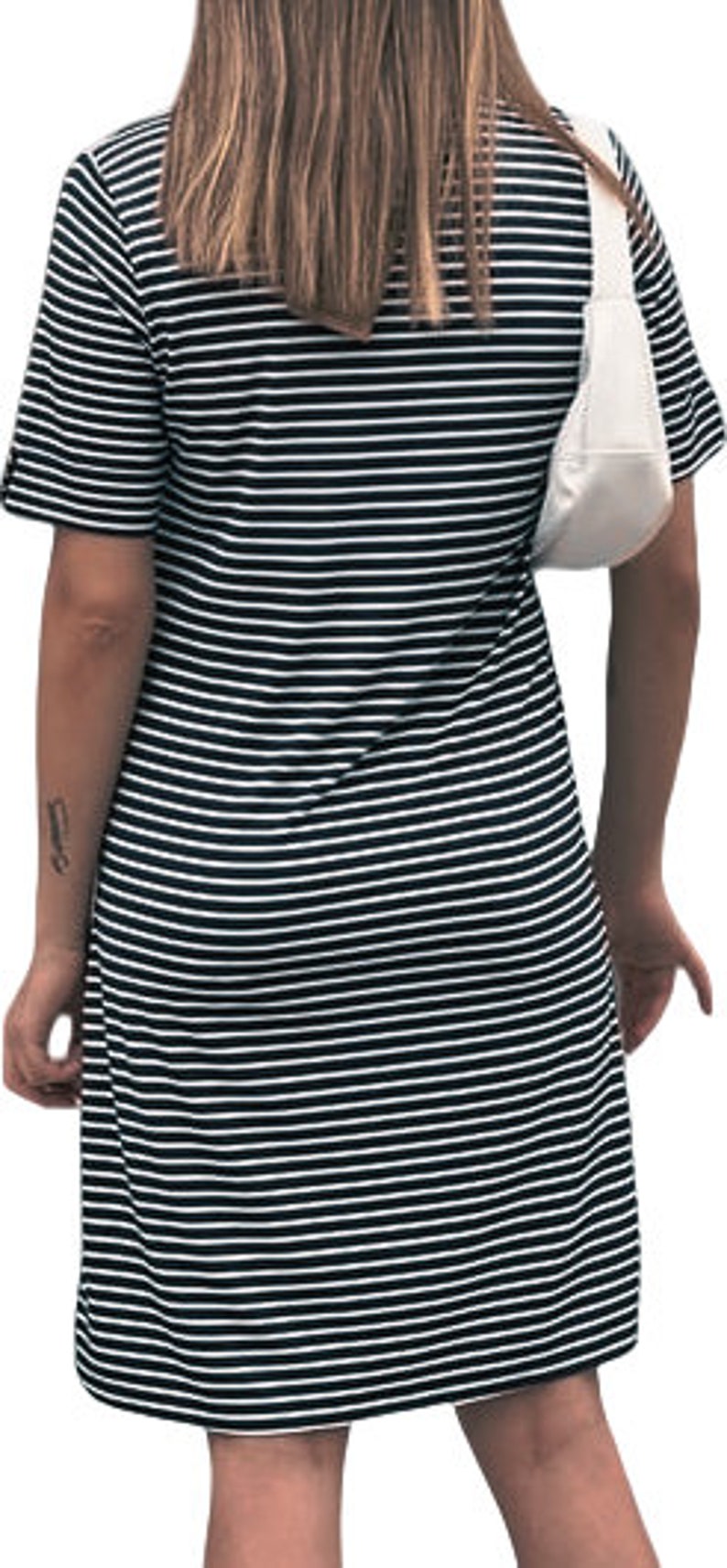 May include: A black and white striped short-sleeved dress with a relaxed fit.