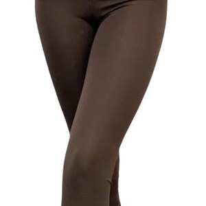 May include: Brown high-waisted leggings made of a soft, stretchy fabric.