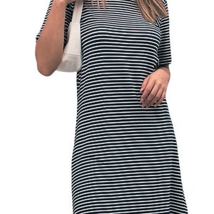 May include: A black and white striped short-sleeved dress with a round neckline.