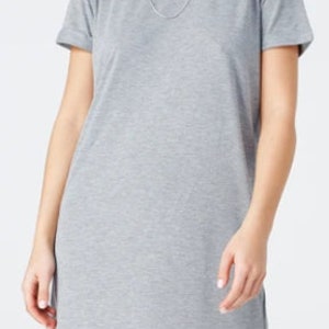 May include: A gray short-sleeved t-shirt dress with a round neckline.
