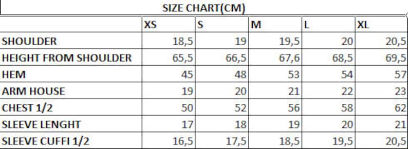 May include: Size chart in centimeters for clothing, showing measurements for shoulder, height from shoulder, hem, arm house, chest, sleeve length, and sleeve cuff. Sizes include XS, S, M, L, and XL.
