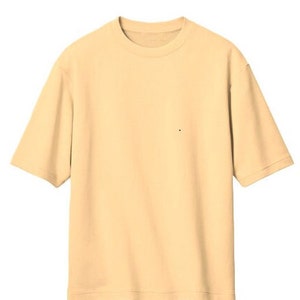 May include: A plain, light yellow short-sleeved t-shirt.
