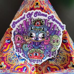 Pegatina con sonido de slime morado