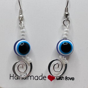 Earrings, handmade, beaded, dangle, drop, swirls, evil-eye, silver-plated brass