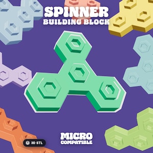 May include: A green three-pronged spinner building block centered on a purple background with various other colored building blocks surrounding it. The text SPINNER BUILDING BLOCK and MICRO COMPATIBLE with a 3D STL icon are visible on the image.
