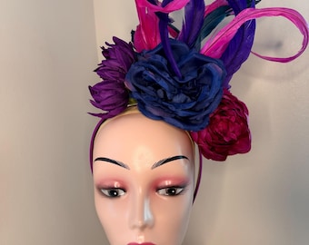 Matchmaker  Deep blue pink and purple flower and feather Fascinator