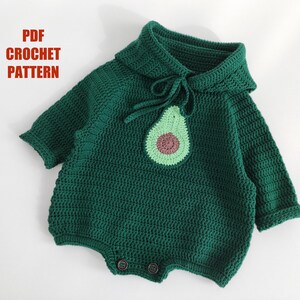 May include: A green crocheted baby onesie with a crocheted avocado applique. The onesie has a hood and long sleeves.  PDF CROCHET PATTERN.