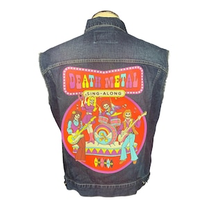 May include: Dark wash denim vest with a colourful graphic on the back. The graphic features a band playing instruments with the words "DEATH METAL" and "SING-ALONG" in a retro font. The vest has a classic collar and a button-up front.