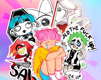 May include: A collection of die-cut vinyl stickers featuring various illustrated characters. Designs include a crying person with pink hair and Spanish text, a green-haired character in a striped suit with the text HOLD THE FUCK UP, and a red-haired figure.