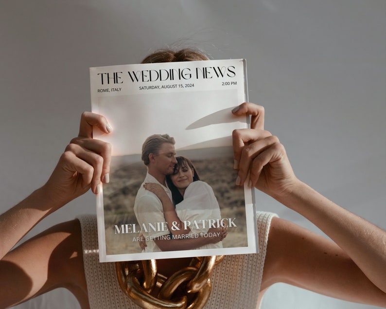 May include: A person holding a newspaper titled "THE WEDDING NEWS" with the headline "MELANIE & PATRICK ARE GETTING MARRIED TODAY." The newspaper is dated Saturday, August 15, 2024, in Rome, Italy, at 2:00 PM. The person is wearing a white top and a gold chain.