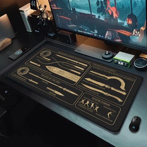 May include: A black rectangular desk mat featuring gold-colored technical diagrams and text titled Red Rising: Razor Weapon System. The design displays various blade configurations, weapon names, and combat stances with detailed line art illustrations.