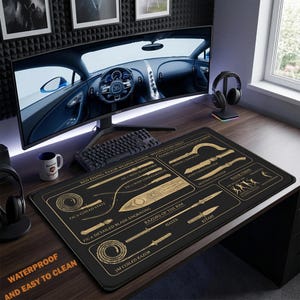 May include: A black rectangular desk mat featuring gold-colored technical illustrations of fictional weapons labeled Red Rising: Razor Weapon System. The print includes diagrams of blades, whips, and coils with text labels like Fig 1: Rigid Blade Form.