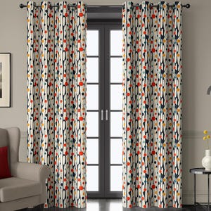 May include: Curtains with a cream backdrop and a repeating pattern of vertical black lines and colourful dots in red, yellow, and blue. The curtains hang in front of a glass door. A chair and side table are visible in the room.