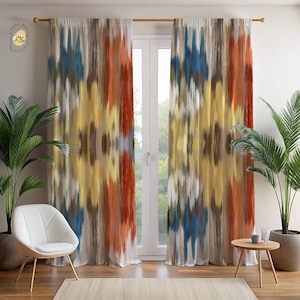 May include: Abstract patterned window curtains in shades of blue, orange, yellow, and brown. The curtains are hanging in front of a white door. A white chair and a small wooden table are in front of the curtains. The curtains have a vertical brushstroke design.