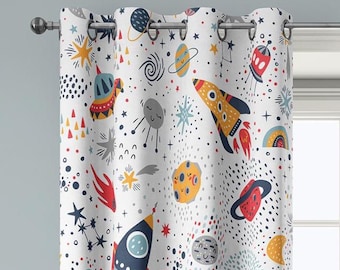 May include: White space-themed curtain panel featuring colorful rockets, planets, stars, and other celestial elements. The design includes red, yellow, blue, and orange accents, creating a playful and educational aesthetic. The curtain has metal grommets for hanging.