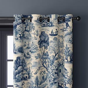 May include: Blue and white toile curtains with a scenic landscape design. The curtains feature a repeating pattern of trees, buildings, and figures in a boat. The fabric is hung on a dark metal rod.