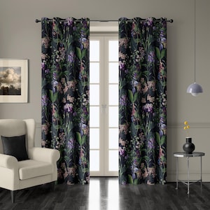 May include: Two dark floral print curtain panels. The curtains feature a pattern of purple, pink, and white flowers with green leaves against a black background. The curtains are hanging in front of a white door.