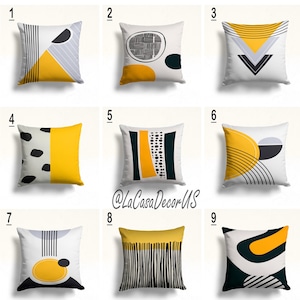 May include: Nine different throw pillow designs featuring geometric patterns in black, white, and yellow. The pillows are all square and have a white background.