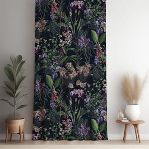May include: Dark floral curtain featuring a botanical design with purple, pink, and green flowers and foliage against a black background. The curtain is made of a soft, flowing fabric and adds a touch of elegance to any room. The curtain is approximately 84 inches in length.