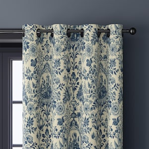 May include: Blue and cream floral patterned curtain panel. The curtain features a repeating design of flowers and foliage in shades of blue against a cream background. The curtain is hanging from a black rod with black grommets.
