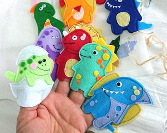May include: Set of ten felt finger puppets featuring different dinosaurs in various colors, including green, red, orange, blue, and purple. The puppets are designed with simple, friendly faces and are perfect for imaginative play.