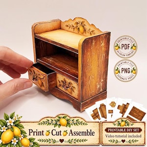May include: A miniature wooden-style cabinet with a pull-out drawer, featuring a rustic brown finish and lemon illustrations. The set includes printable PDF and PNG files, with text reading Print Cut Assemble and Printable DIY Set.
