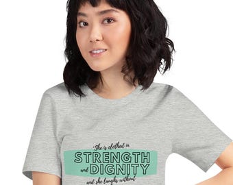 Proverbs 31:25 "She is clothed in strength and dignity..." - Unisex t-shirt