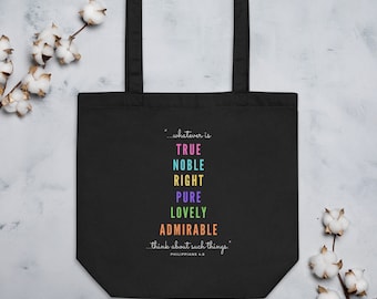 May include: Black tote bag with a quote from Philippians 4:8, "...whatever is TRUE NOBLE RIGHT PURE LOVELY ADMIRABLE...think about such things." The quote is printed in rainbow colors.