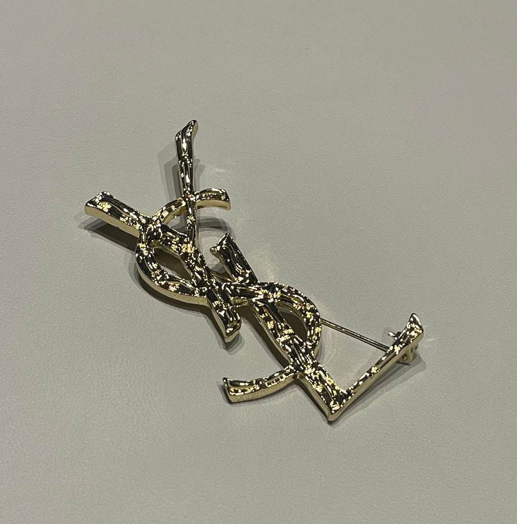 Ysl brooch price best sale