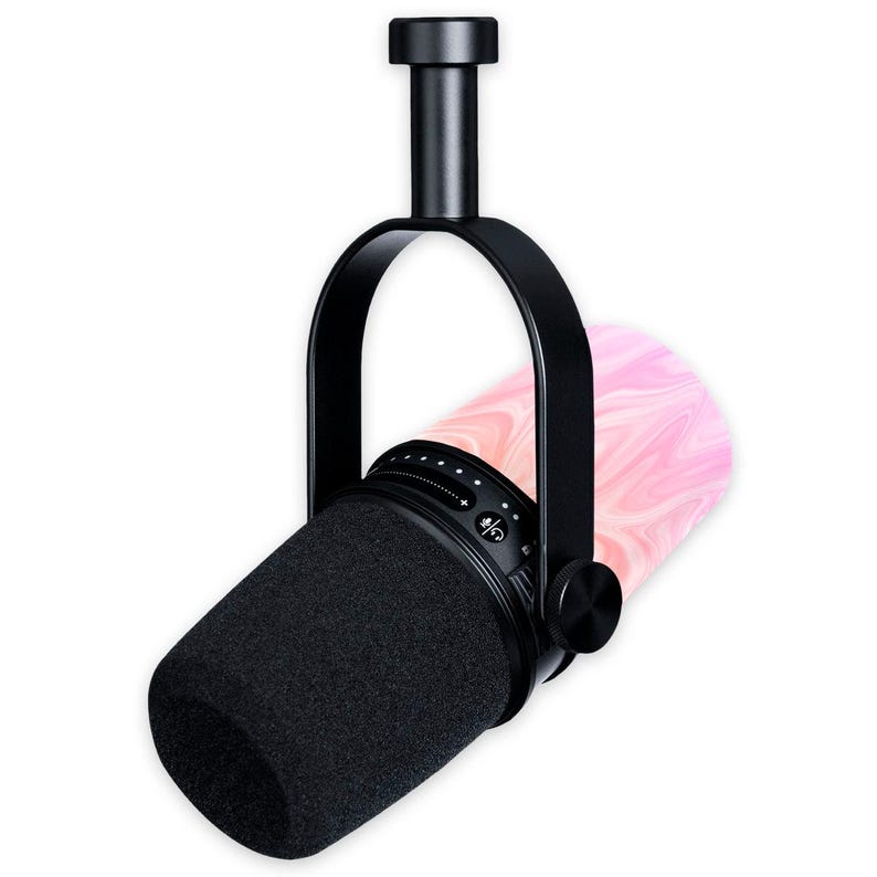 May include: A black microphone with a foam windscreen, suspended by a black bracket. The microphone has a pink and white marbled design on the side. The microphone has a volume control knob.