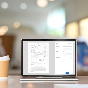 May include: A laptop computer displaying a blueprint of a house with a print dialogue box open. The print settings include options for paper size, pages, copies, layout, and more settings.