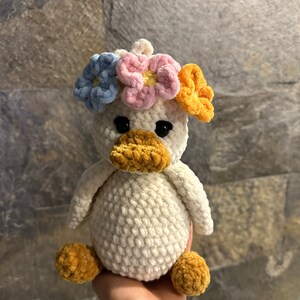 CROCHET PATTERN Duck. Ducking with flowers. Amigurumi. Plush toy. Crochet toy. English PDF instructions with 40 photos of the process zdjęcie 5