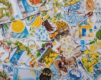 May include: A collection of die-cut stickers featuring watercolor illustrations of Mediterranean themes, including lemons, blue and white pottery, coastal architecture, seafood dishes, classical statues, donkeys, and floral arrangements.