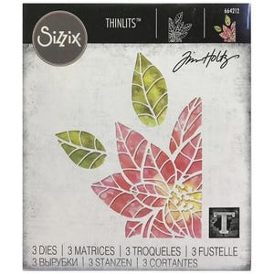May include: A Sizzix Thinlits die set by Tim Holtz, item number 664212, featuring three metal cutting dies for crafting. The packaging displays a graphic of a pink poinsettia flower and two green leaves with a watercolor texture and white outlines.