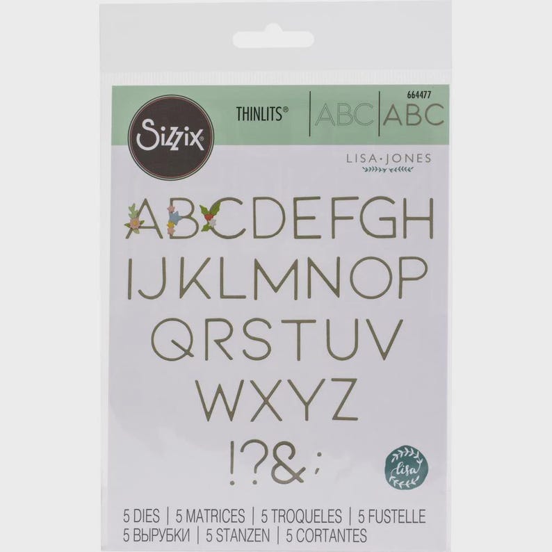 May include: A package of Sizzix Thinlits dies featuring the alphabet letters A through Z, along with punctuation marks. The letters are in a sans-serif font and are in a light green color. The package also includes the text "LISA-JONES".