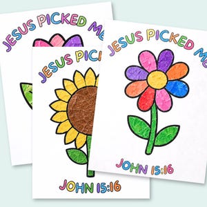 May include: Three white rectangular art prints featuring colourful mosaic-style flower illustrations. Each print displays the text JESUS PICKED ME in multi-coloured letters at the top and JOHN 15:16 in multi-coloured letters at the bottom.