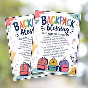 May include: Two identical rectangular cards featuring the text BACKPACK blessing and LORD BLESS THIS BACKPACK with a prayer. The design includes colorful abstract brush strokes, small dots, and illustrations of three backpacks in red, yellow, and purple.