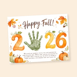 May include: A white rectangular print featuring the text Happy Fall! at the top. The number 2026 is displayed with a green handprint replacing the zero. The design includes watercolor illustrations of orange pumpkins, maple leaves, and text.